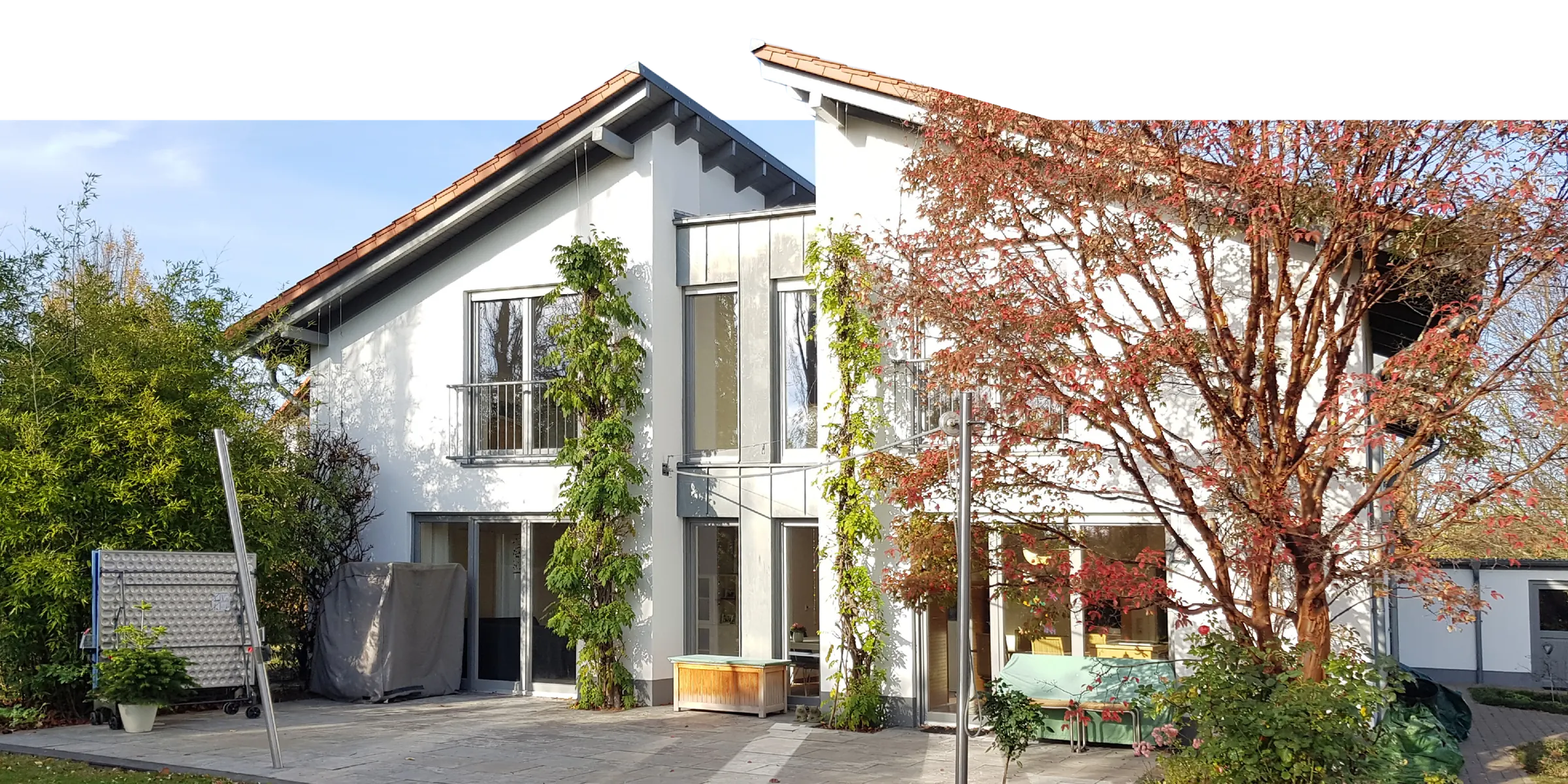 Einfamilienhaus mit Holzelementen und Garten im Herbst – gebaut von DENKER Eigenheim